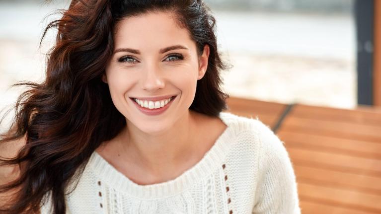 Woman Smiling Outside | Glen Waverley Dental Bridges
