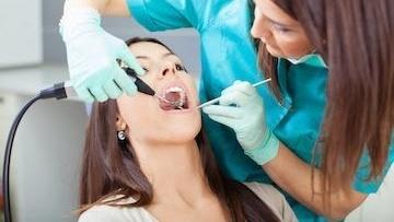 woman getting teeth cleaned in mount waverley