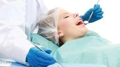 woman getting a dental exam