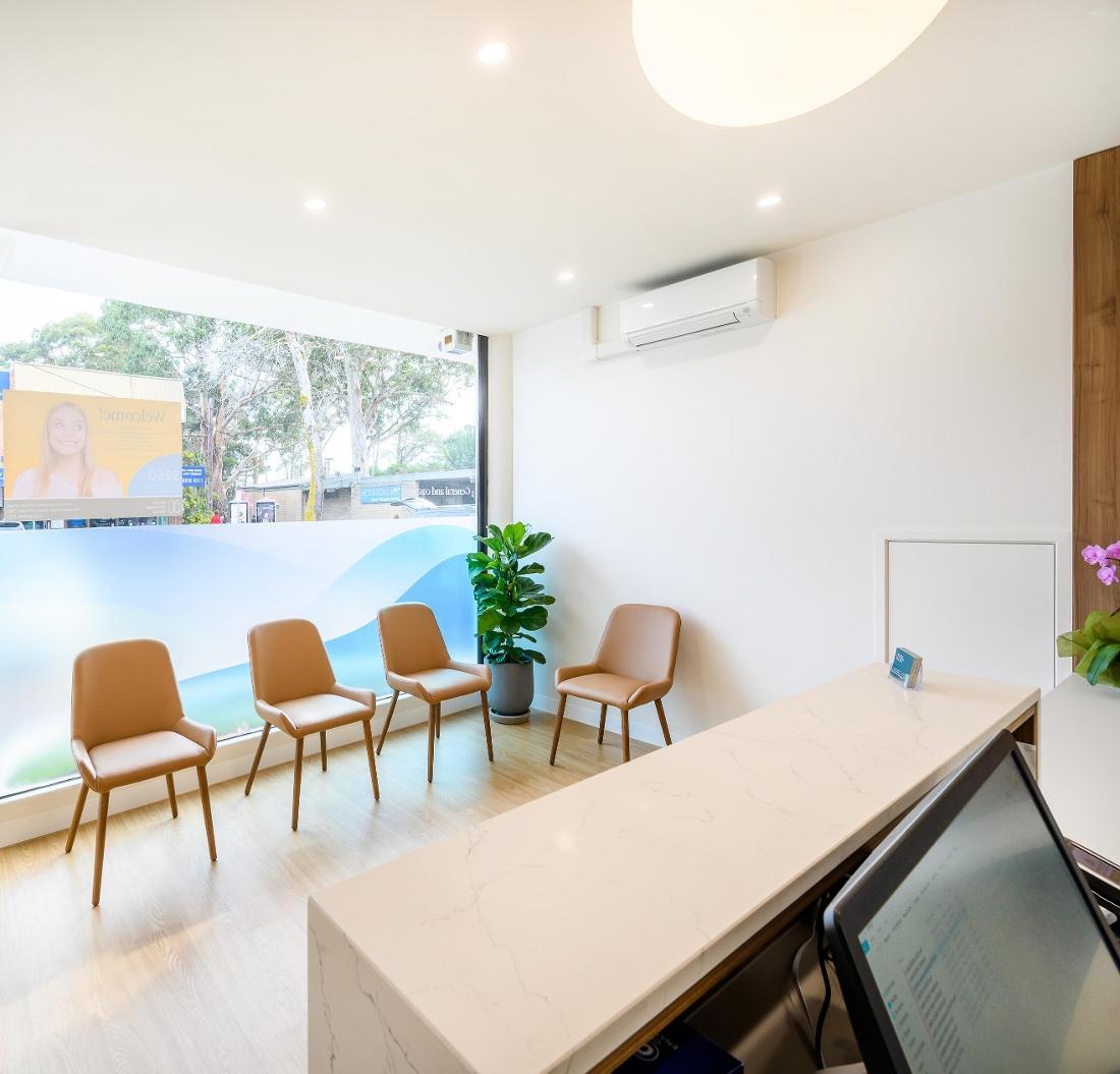 Reception area with chairs and front desk
